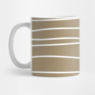 Drawing White Lines Across Tan Mug